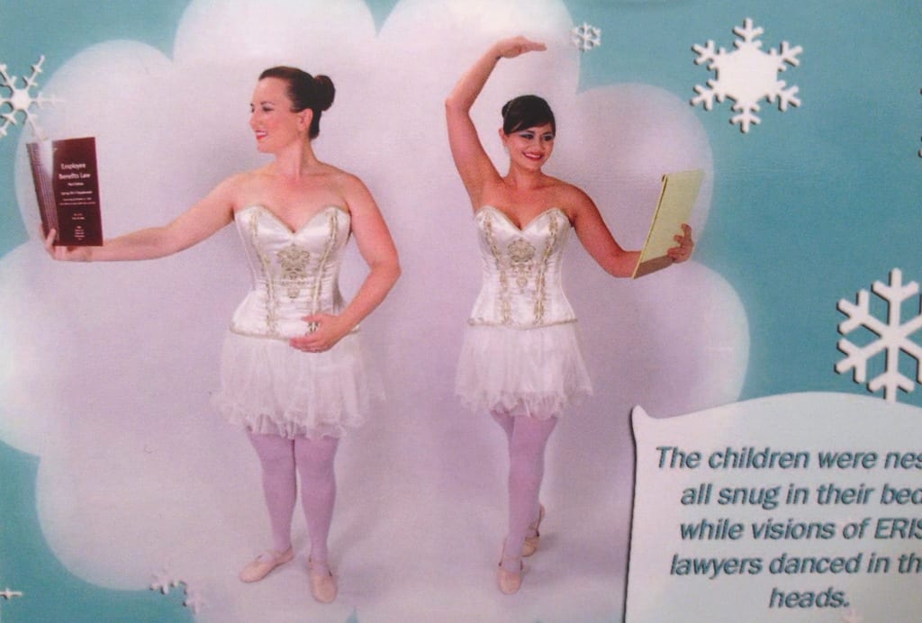 Close-up of Holiday Cards featuring two Attorneys dressed up as Ballerinas