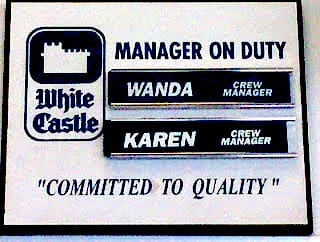 White+Hen+Committed+to+Quality+cliche+sign